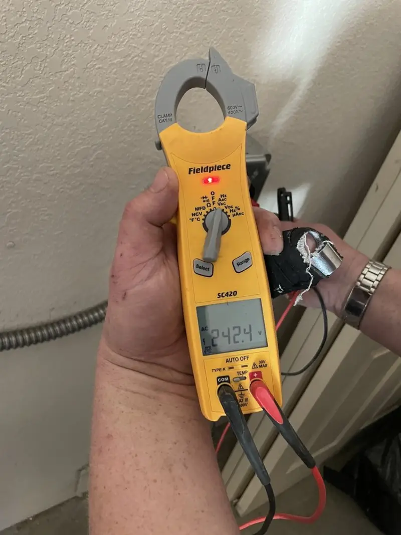 Voltage testing with clamp meter during Hot Tub / Pool Electrical Wiring in Catalina